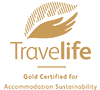 Logo de Travelife, tu guía de confianza para 001 Hotels: Corporativa y sostenibilidad.