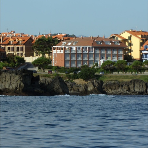 Torre Cristina Hotel: seaside views and coastal architecture.