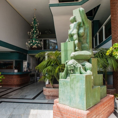 Sculpture at the entrance of Torre Cristina Hotel, modern lobby.