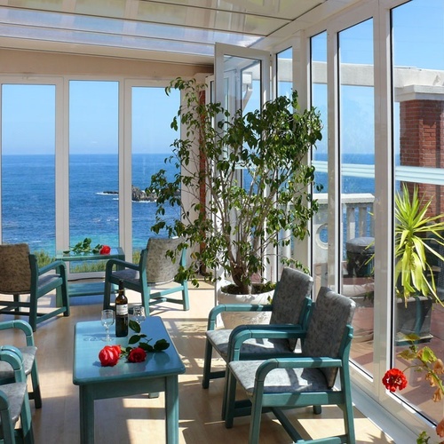 Bright living room with sea views at Torre Cristina, ideal for relaxation.