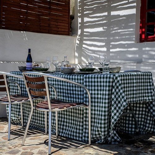 a table with a green and white checkered table cloth