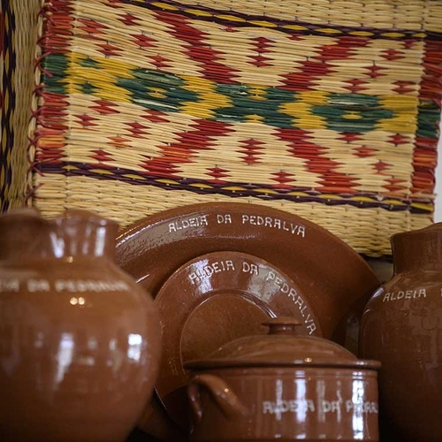 Aldeia da Pedralva: traditional pottery and woven decor at the charming village.