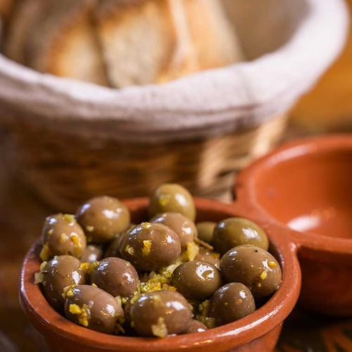 Marinated olives and bread at Aldeia da Pedralva, a charming hotel.