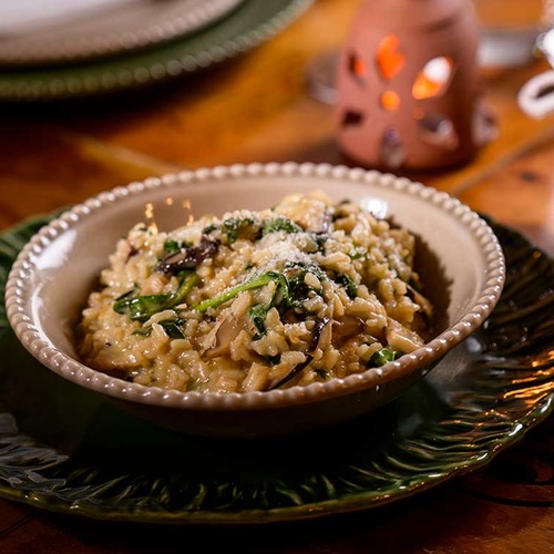Gourmet mushroom risotto with spinach at Aldeia da Pedralva.