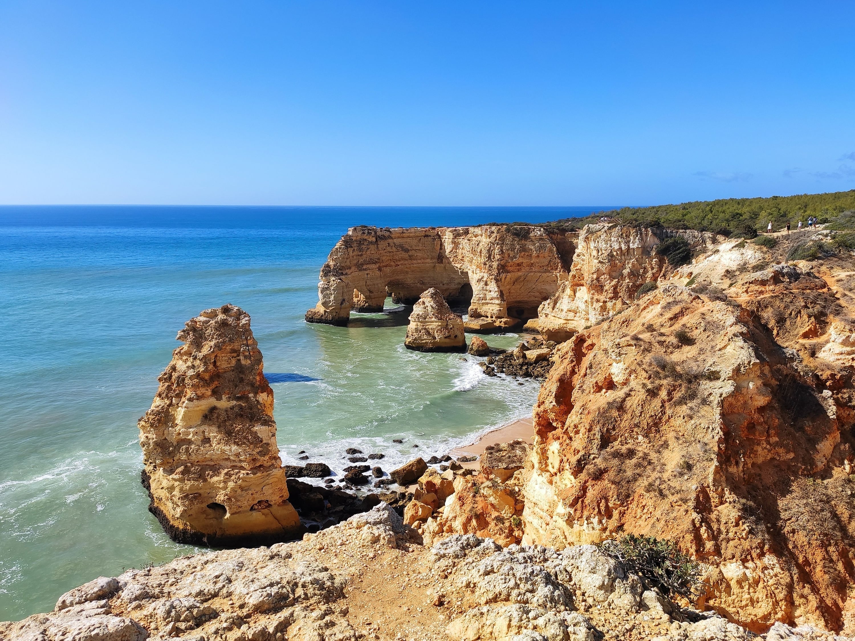 Stunning Algarve coast with rock formations and beach, perfect for a Aldeia da Pedralva getaway.