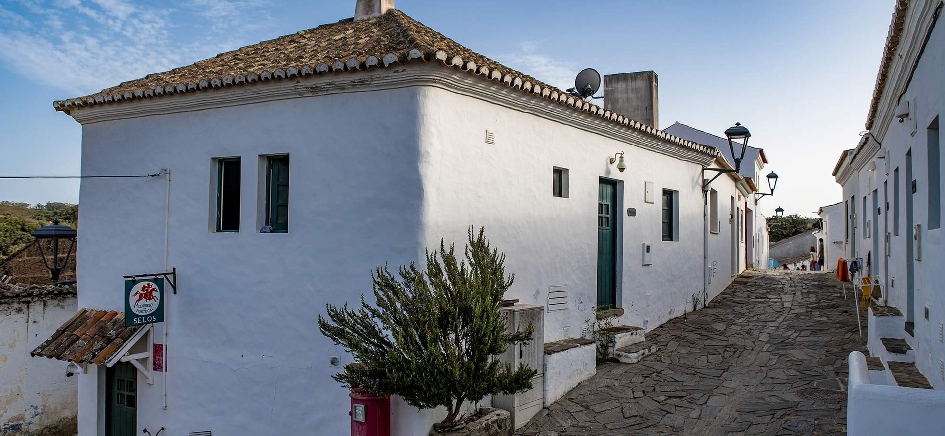 Aldeia da Pedralva, a charming Portuguese village with whitewashed buildings and stone streets.