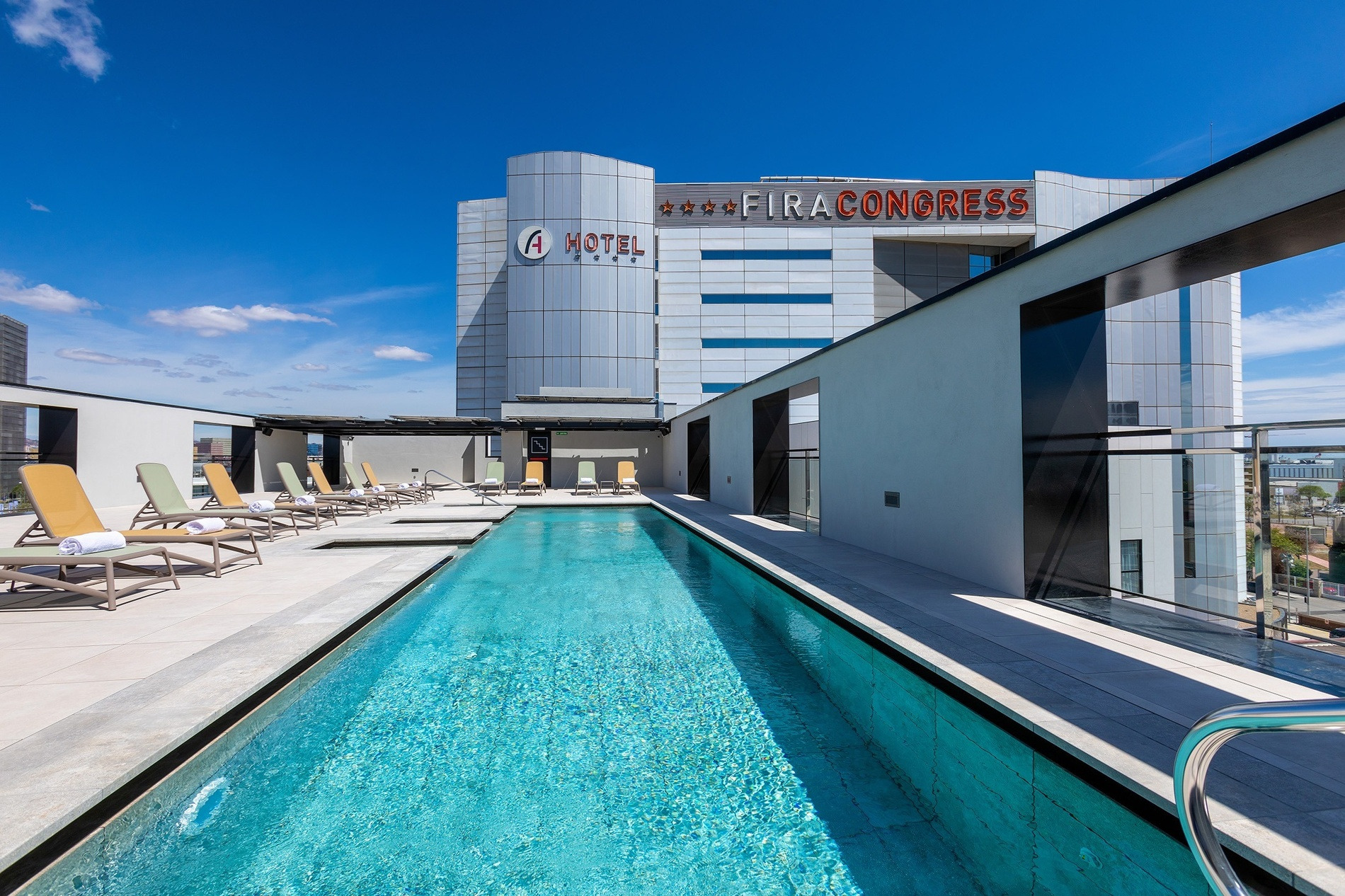 Panoramic rooftop pool & hotel services at Alexandre Fira Congress, Barcelona.