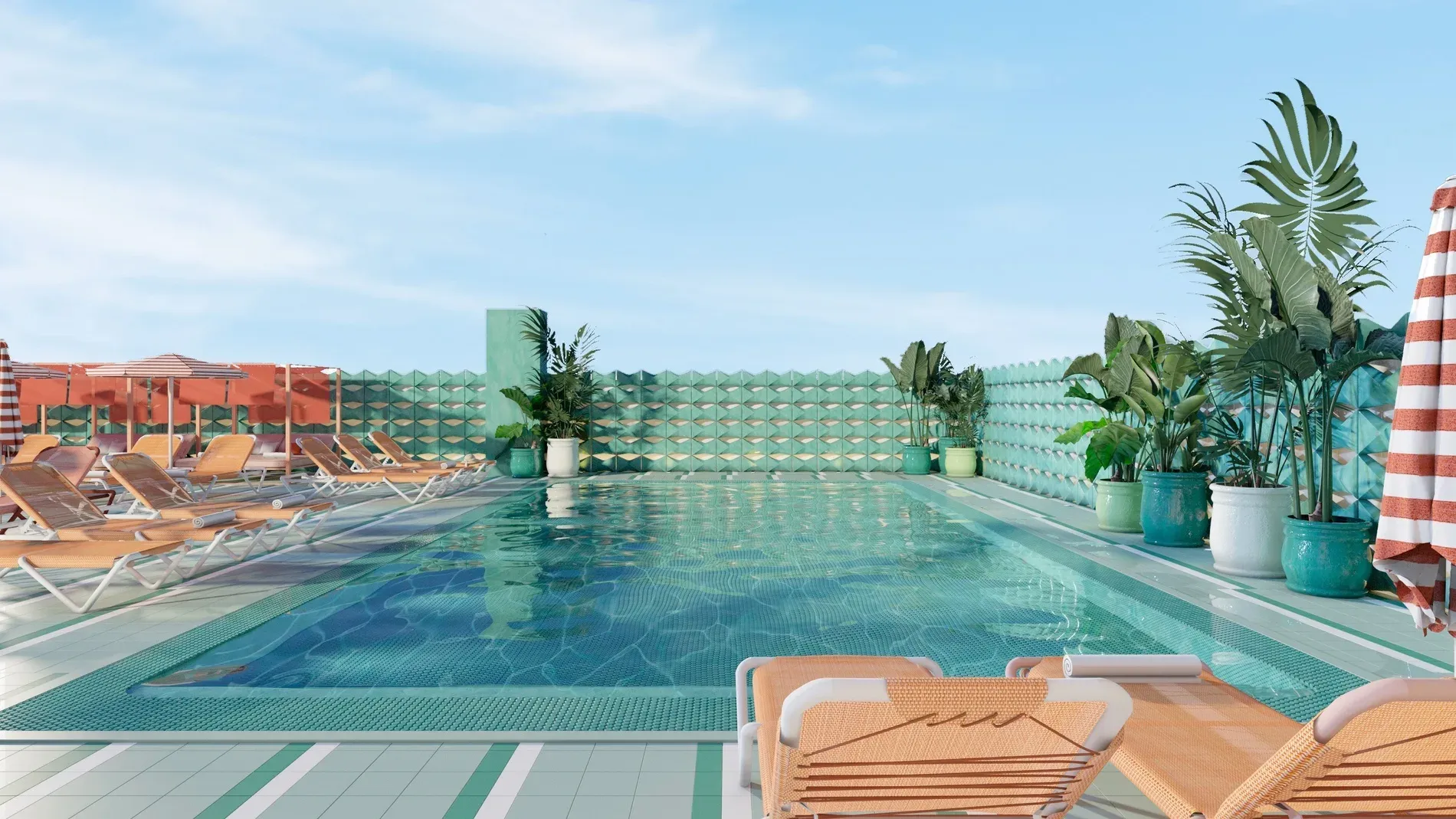 Piscina y tumbonas en Hotel Ángela, Fuengirola. ¡Reserva ya!
