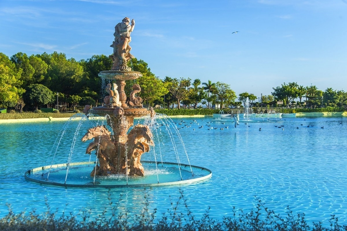a fountain in the middle of a body of water