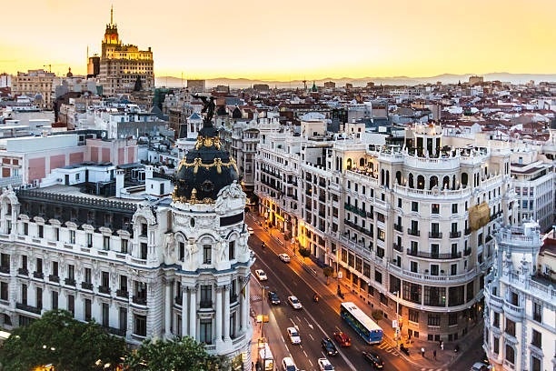 an aerial view of the city of madrid at sunset