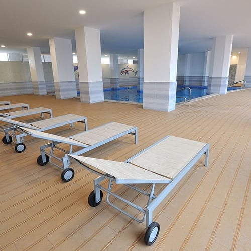 a swimming pool with a dolphin on the wall