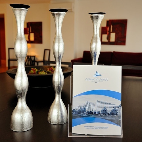 a brochure for oceano atlantico hotel sits on a table