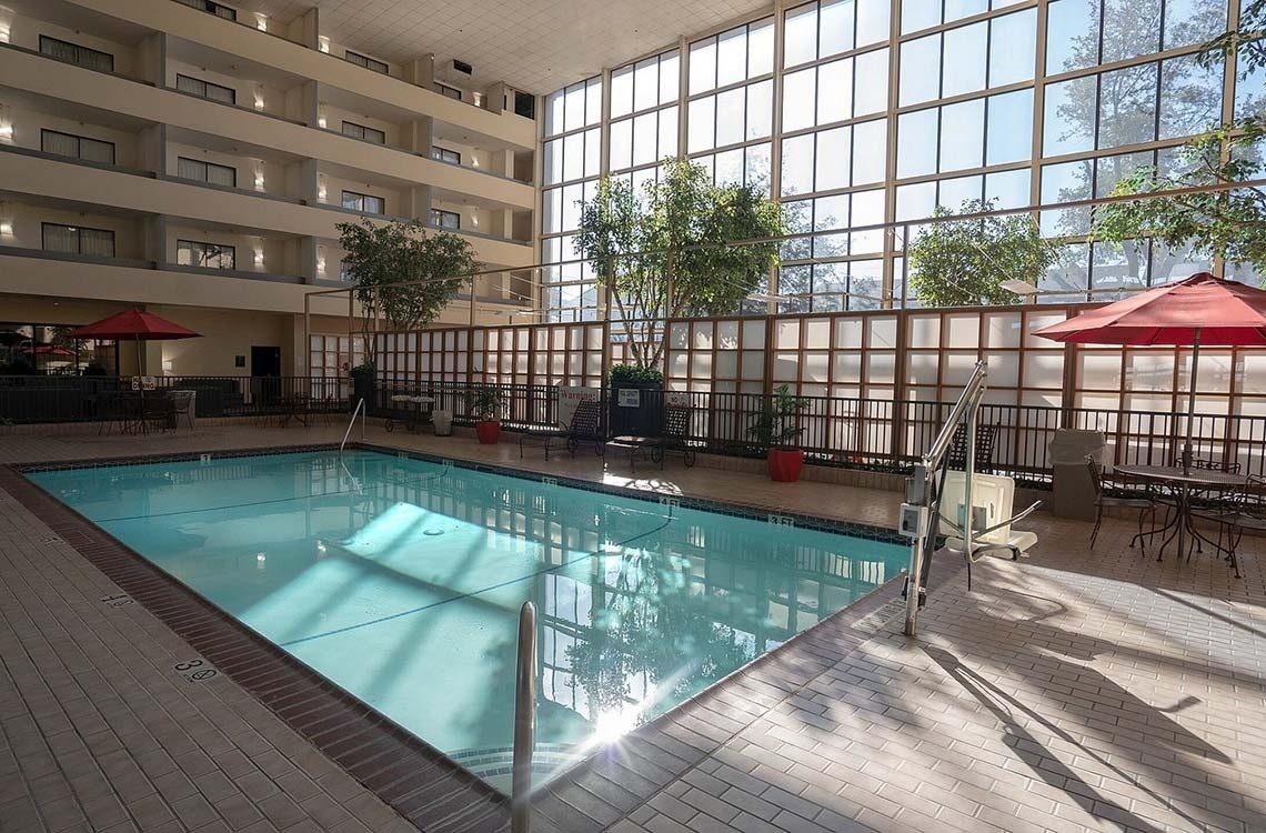 a large indoor swimming pool in a hotel