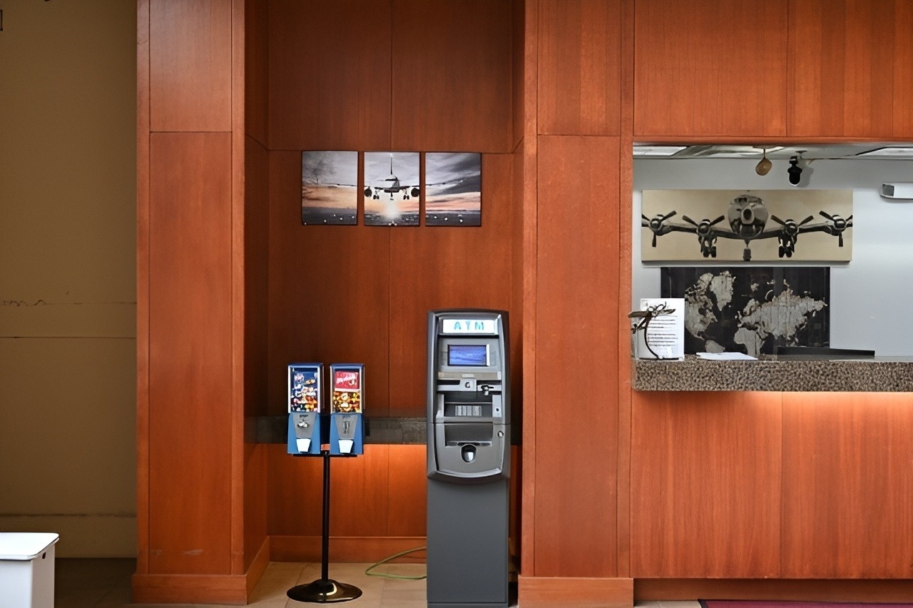 an atm machine with the word atm on it