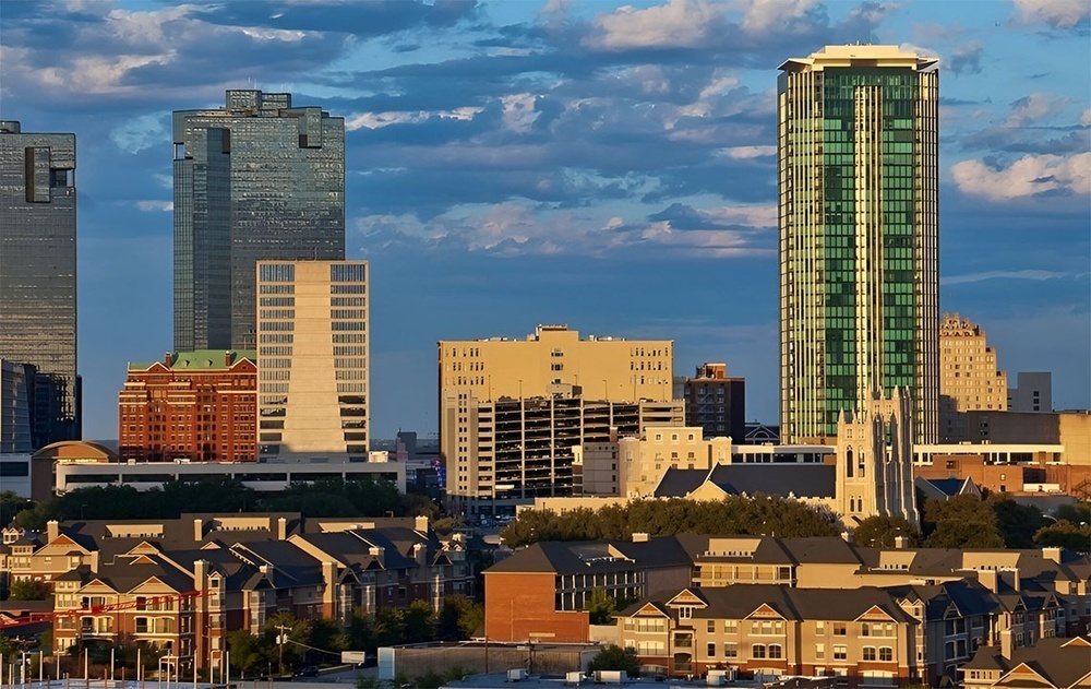 a city skyline with a lot of tall buildings