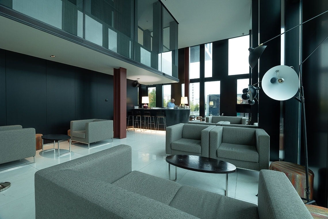 a room with a lot of chairs and a table