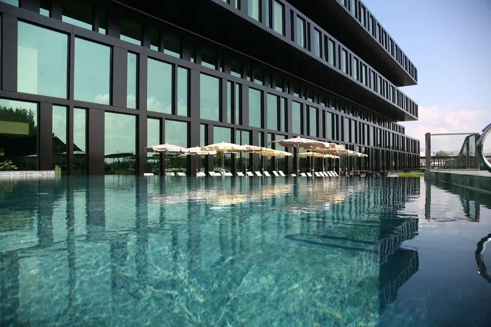 a man and a woman looking into each other 's eyes