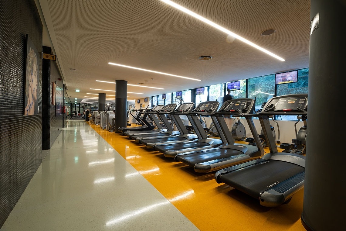 matrix treadmills are lined up in a gym