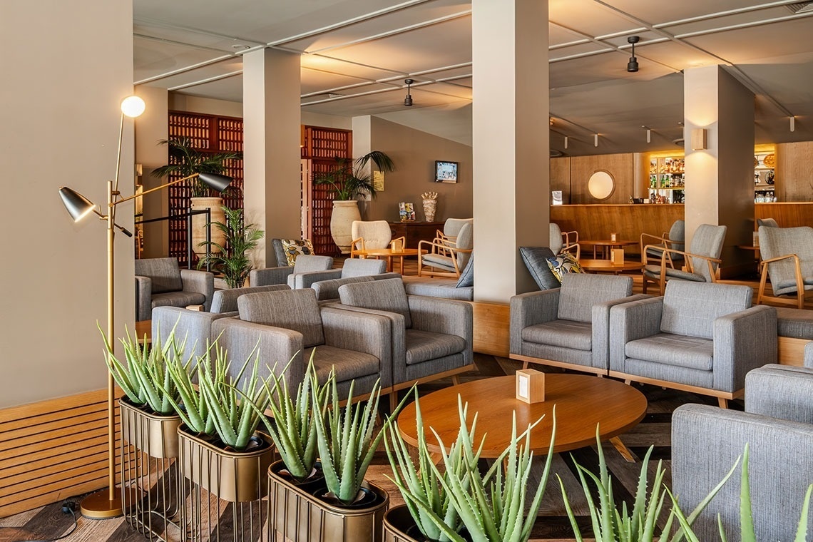 a large room with lots of chairs and tables