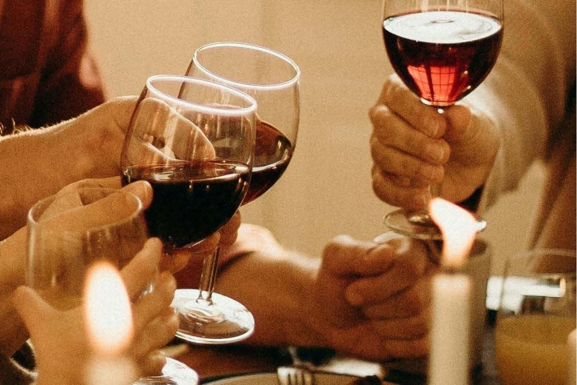a bar with stools in front of a building