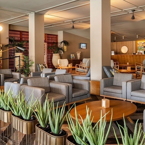 a large room with a lot of chairs and tables