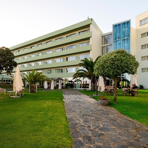 a large building with a walkway leading to it