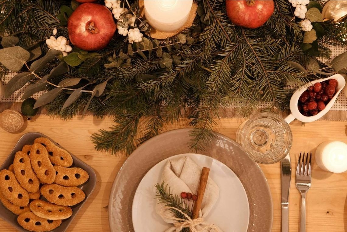 a bar with stools in front of a building