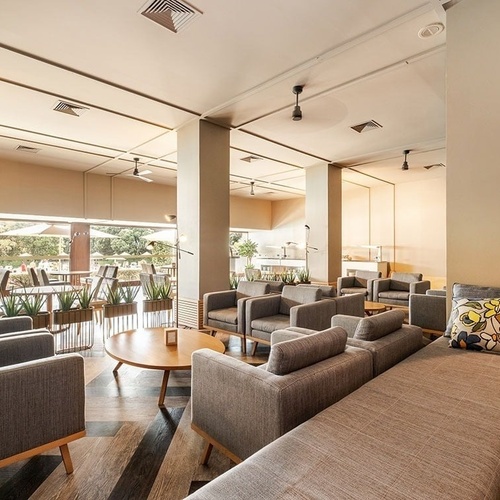 a large room with a lot of furniture and tables