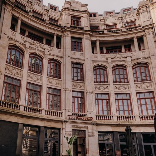 An ornate, curved stone building, identified as 