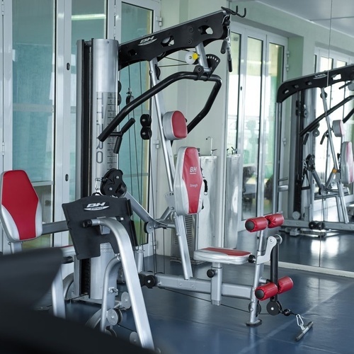 Azoris Corporativa gym with stationary bikes and exterior views.