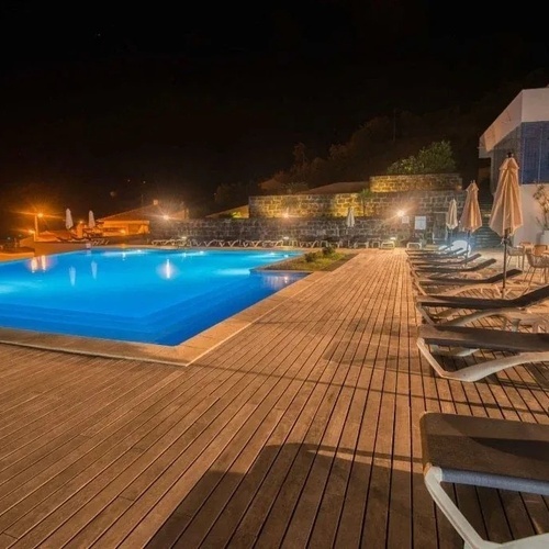 TERRAZA PISCINA DE NOCHE