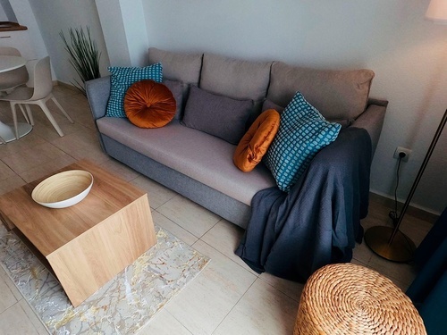 a living room with a couch and a coffee table