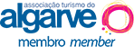 um logotipo para a associação de turismo do algarve