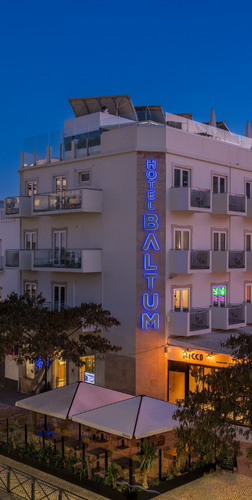 a man is holding a map and a woman is holding a camera