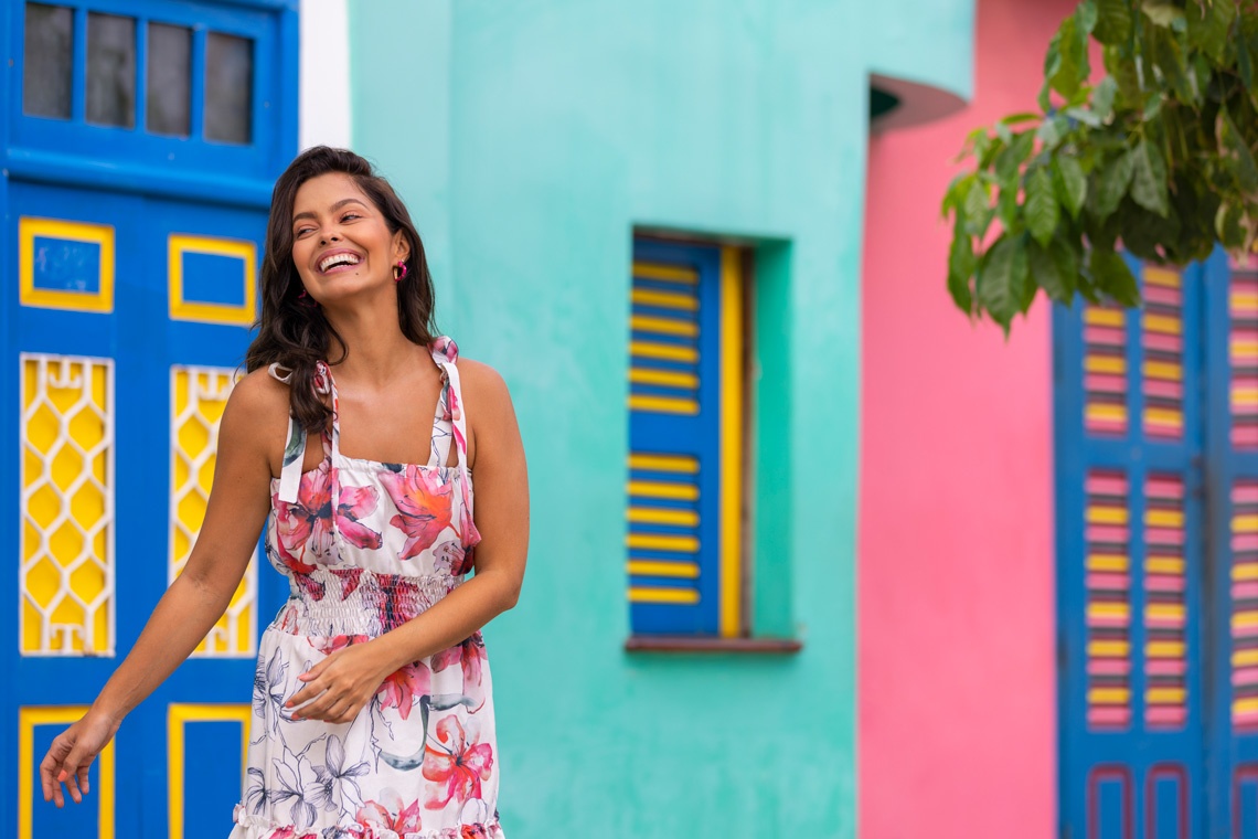 Vibrant Barlovento hotel facade with colorful doors and windows.