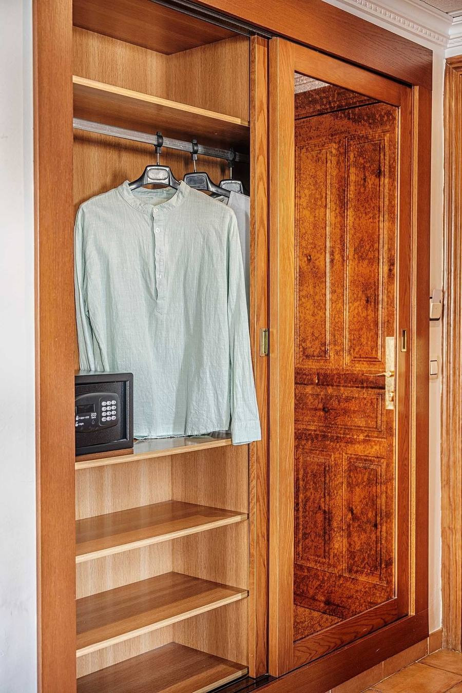 In-room safe and hangers in a Frigiliana Hotel wardrobe | Beneste Hotels