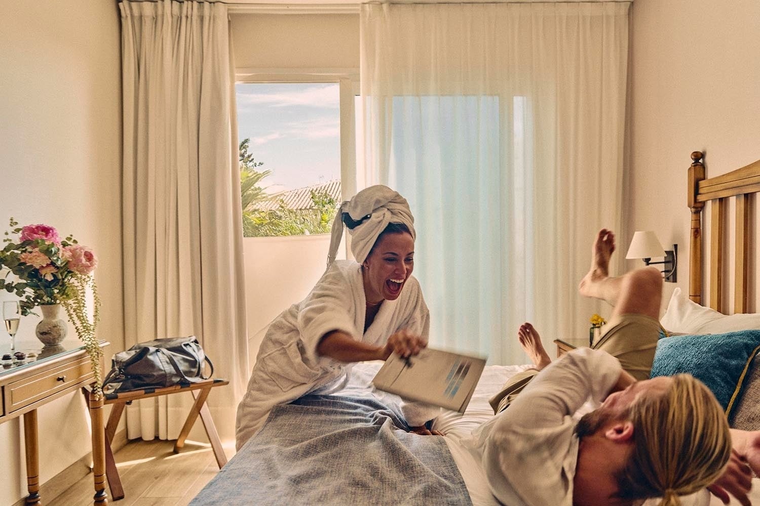 Playful couple in hotel rooms, Beneste Hotels Official Website