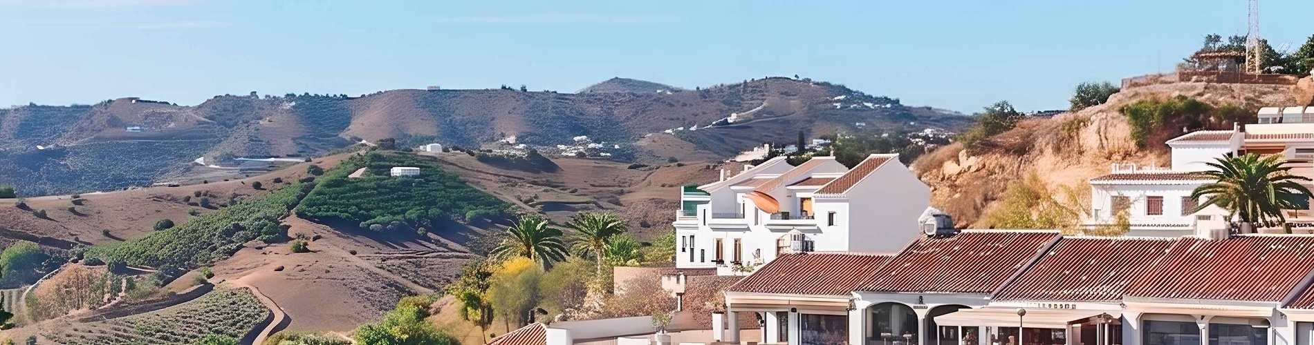 BENESTE: Corporate views of sea and mountains from white Andalusian hotel.