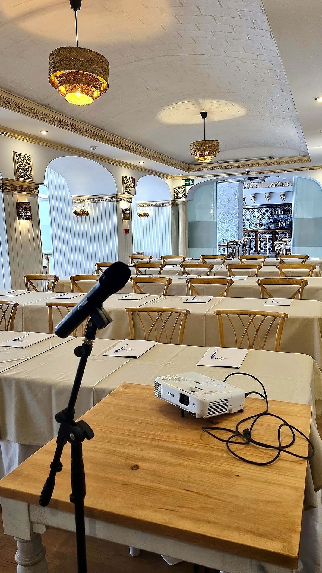 Conference room setup with projector and microphone for Events | Frigiliana Hotel | Beneste Hotels | Official website