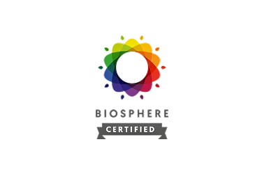 Biosphere Certified hotel logo, a colorful floral emblem and certification badge Hotel Best Autohogar