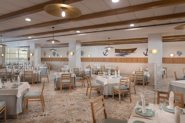 a restaurant with tables and chairs and a sign that says helium