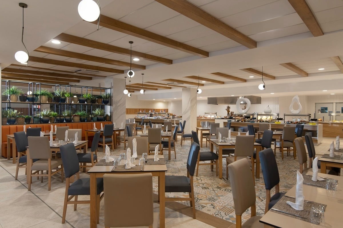 a restaurant with a lot of tables and chairs