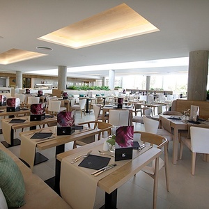 a restaurant with a lot of tables and chairs