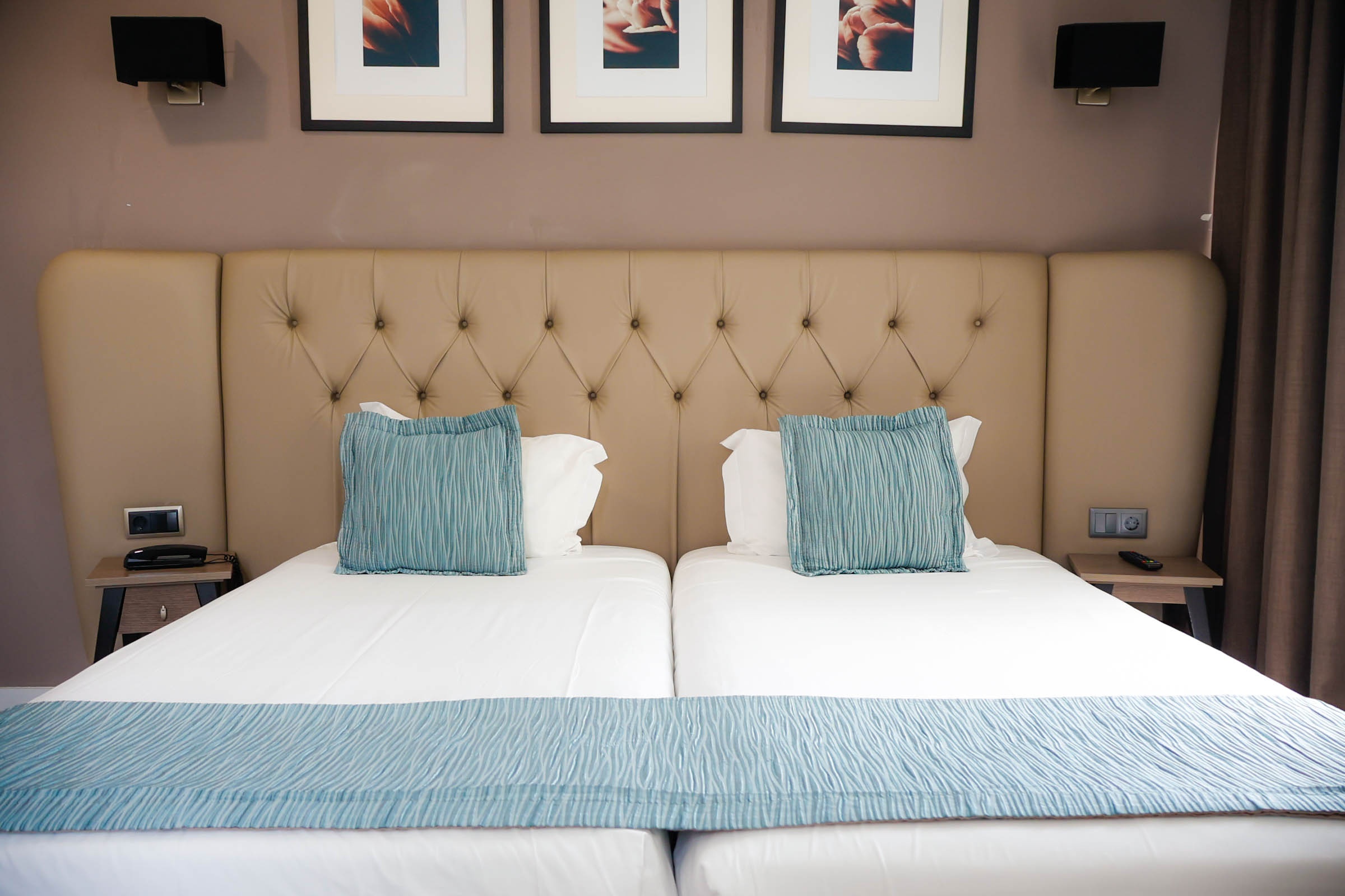 Comfortable twin room with soft bedding, ideal for Bienestar Vizela relaxation.