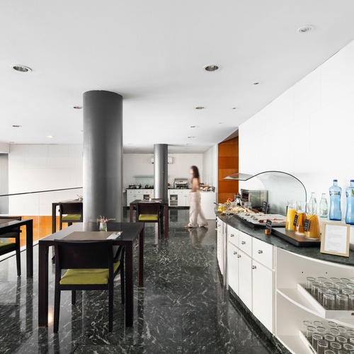 Bohemian Hotels breakfast buffet: fresh fruits, juices, dairy, and cereals.