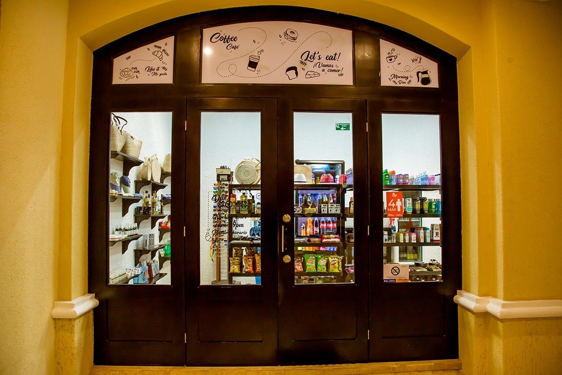 a store front with a sign that says coffee shop