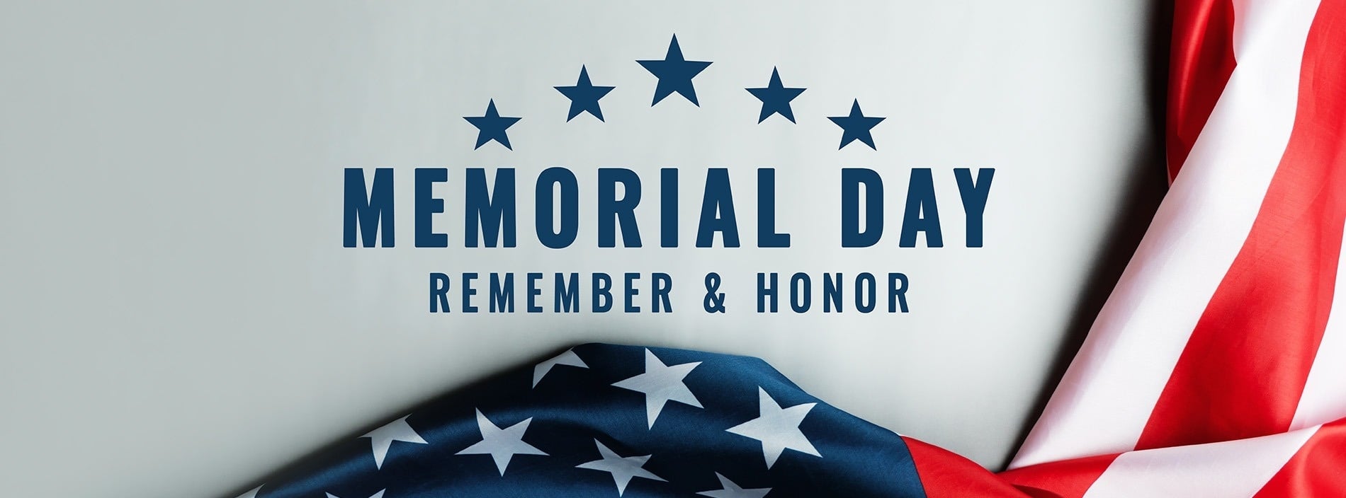 Memorial Day banner for hotels with American flag, stars, and 'Remember & Honor' message.