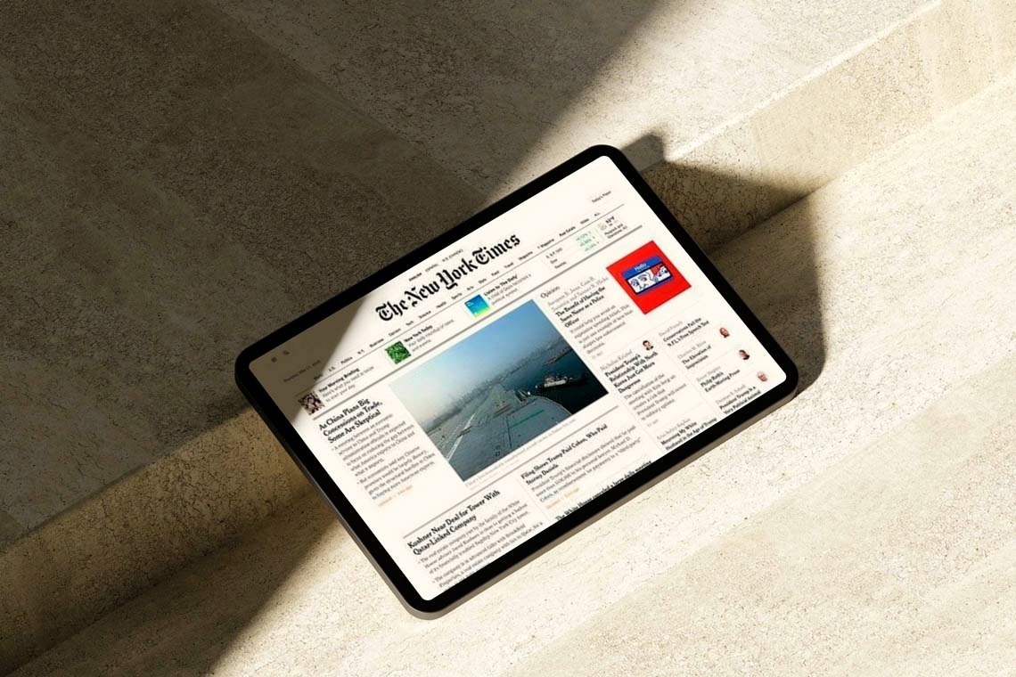 a tablet with the new york times on the screen