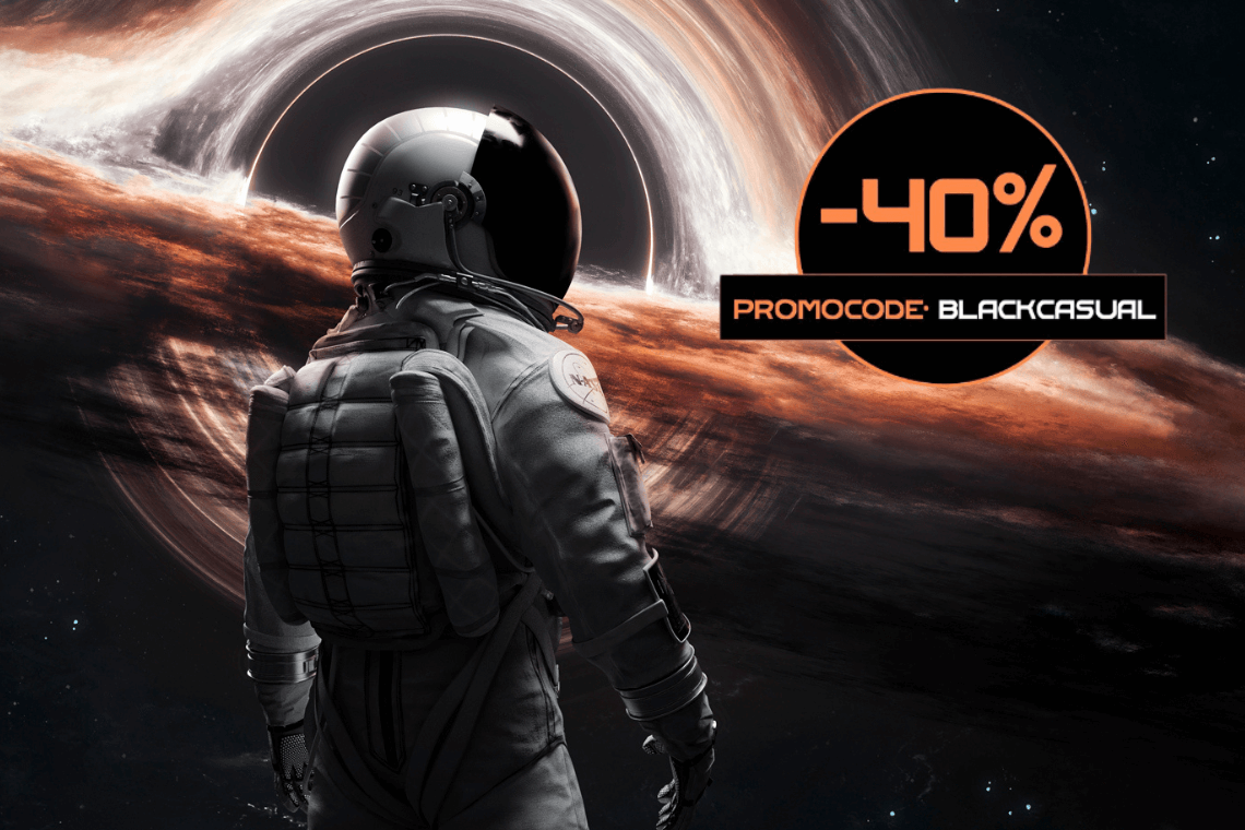 een vrouw ligt op een bed met een laptop