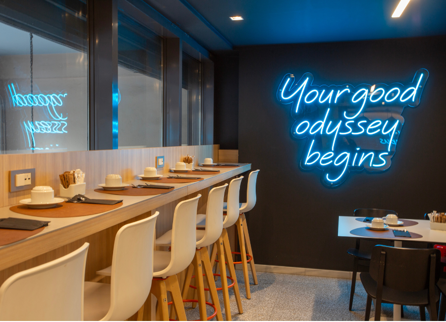 Hotel breakfast area with modern counter seating and 